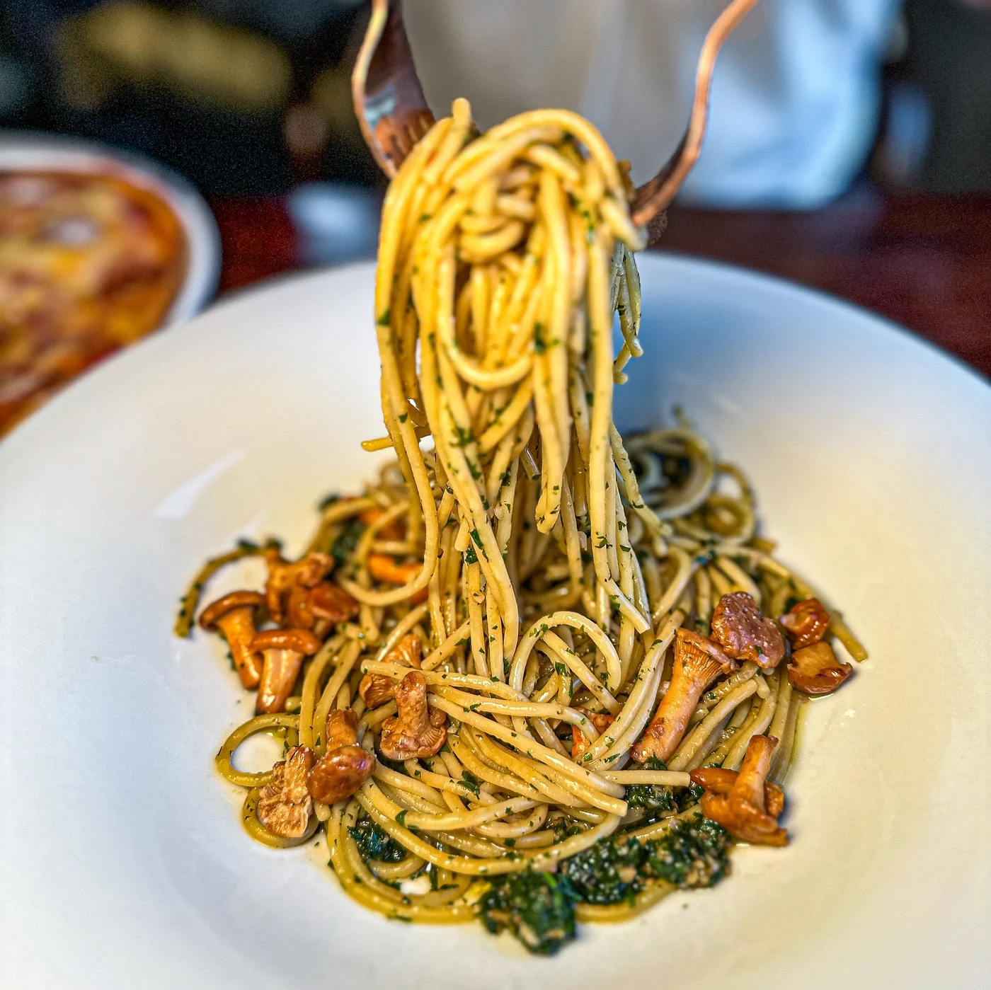 Mahina Vegan Table chanterelle pasta lifted on a fork
