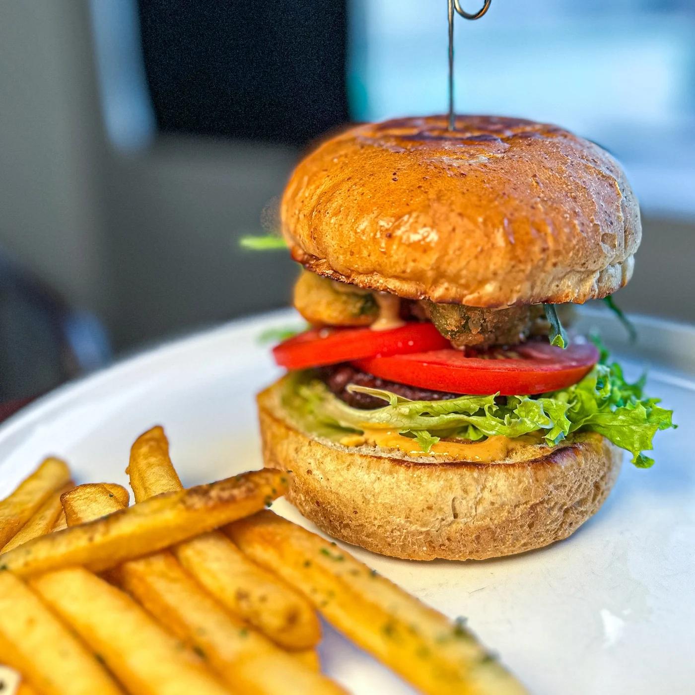 Mahina Vegan Table burger with fried avocado and rocket