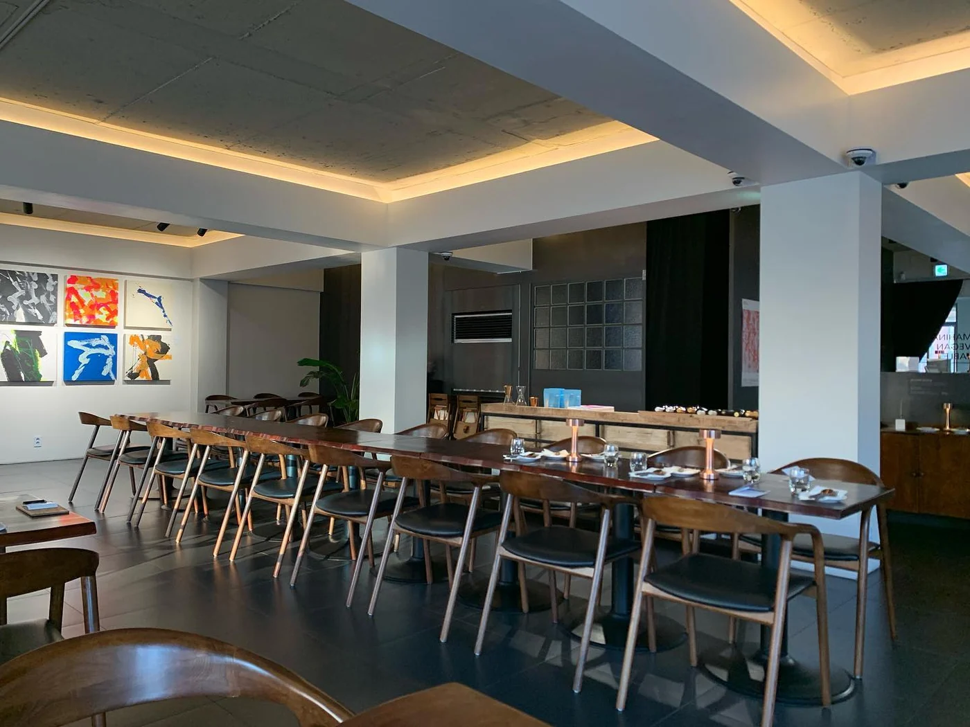 A long table joined together for group seating at Mahina Vegan Table