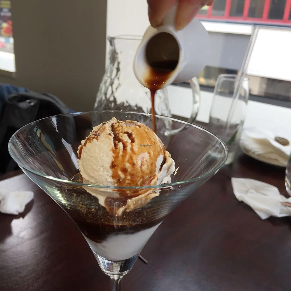 Espresso being poured over Mahina's vegan affogato