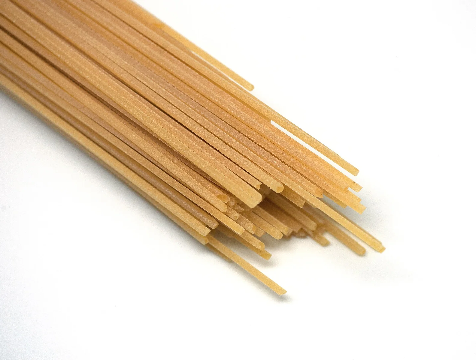 Spaghetti alla chitarra, long dried pasta with a square cross-section