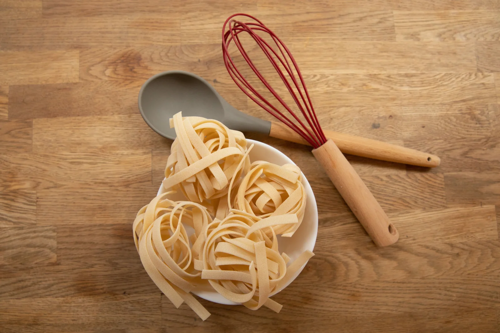 Dried tagliatelle arranged in nests
