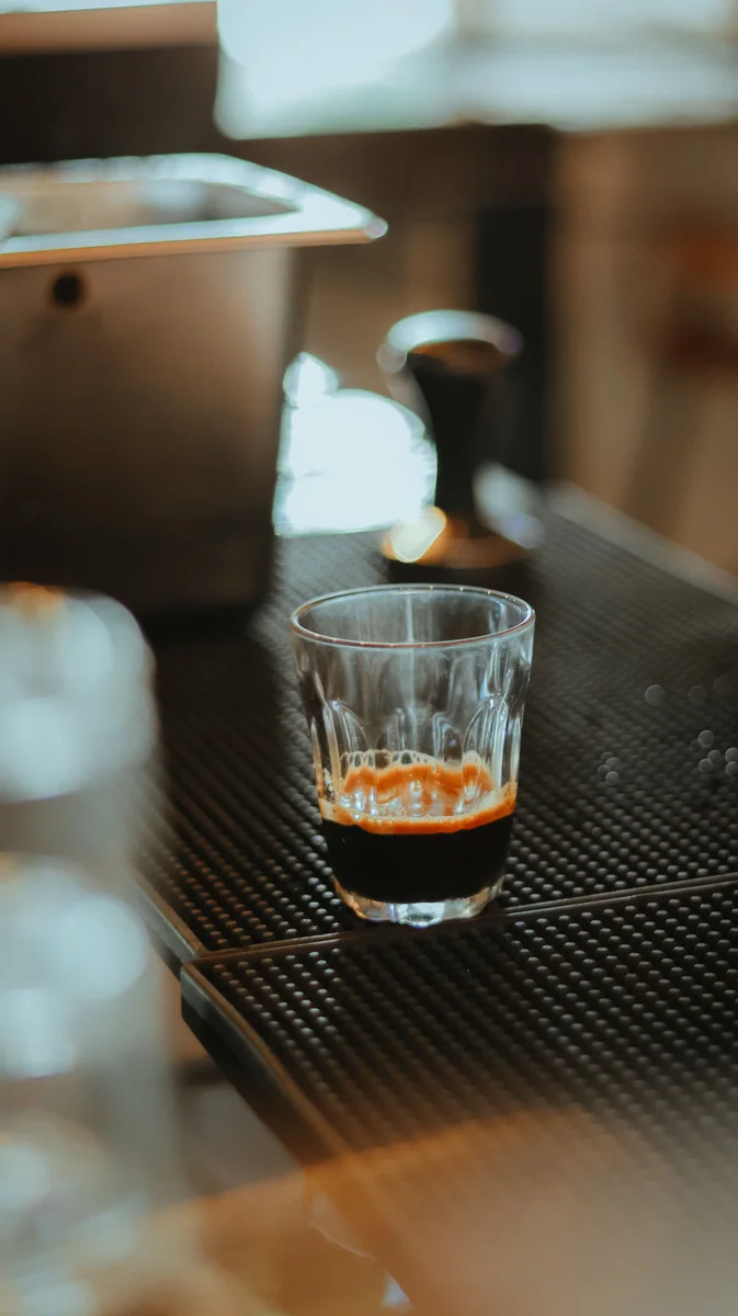 Espresso and crema in a small glass