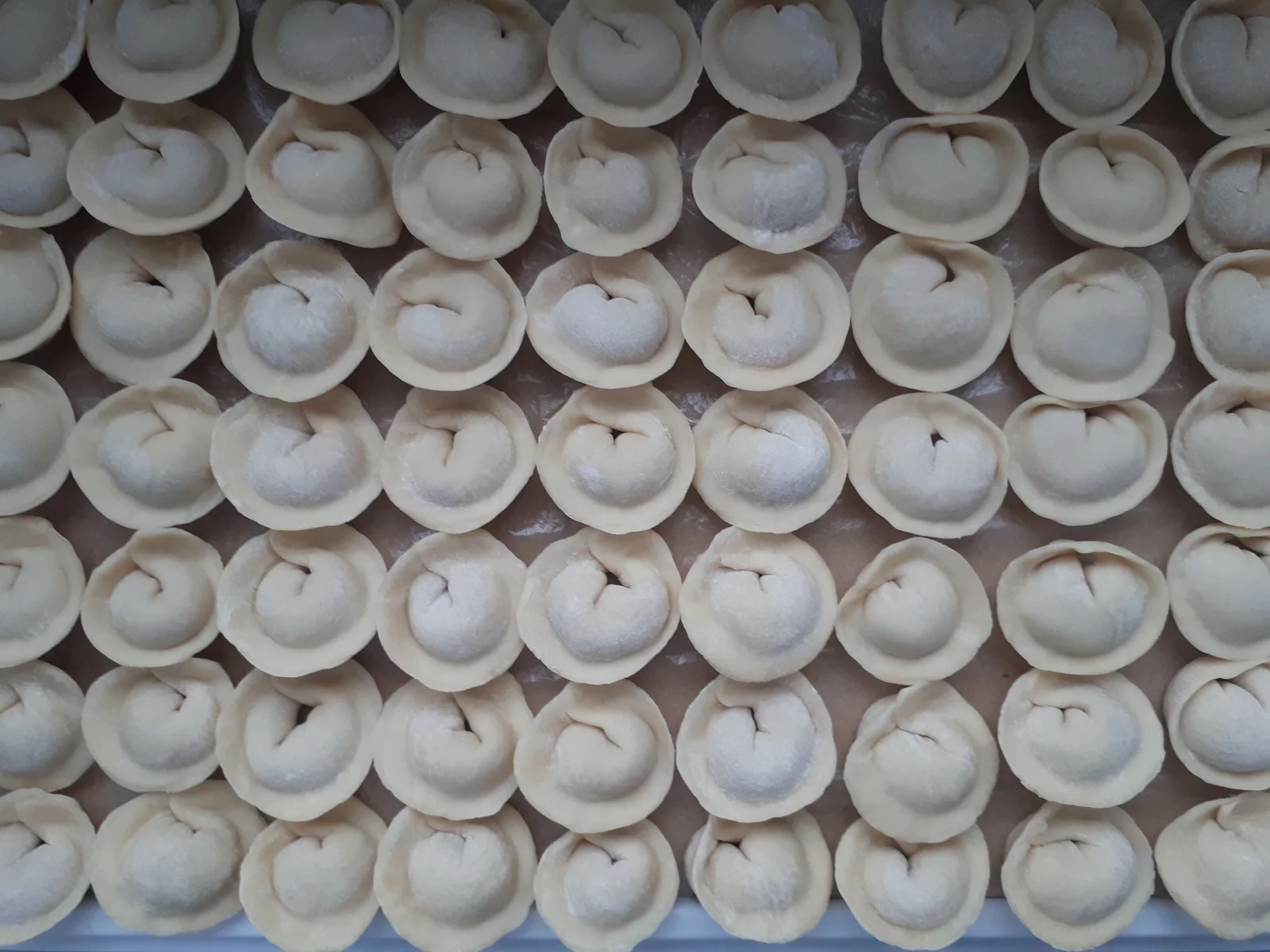 Tortellini made from small pieces of dough folded into rings